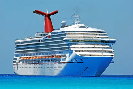 Cruise ship Carnival Victory dropped the anchor on deep blue ocean